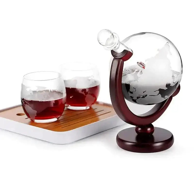 Whiskey Decanter Globe set with wood stand, featuring sailboat design and integrated wine aerator, includes glasses.
