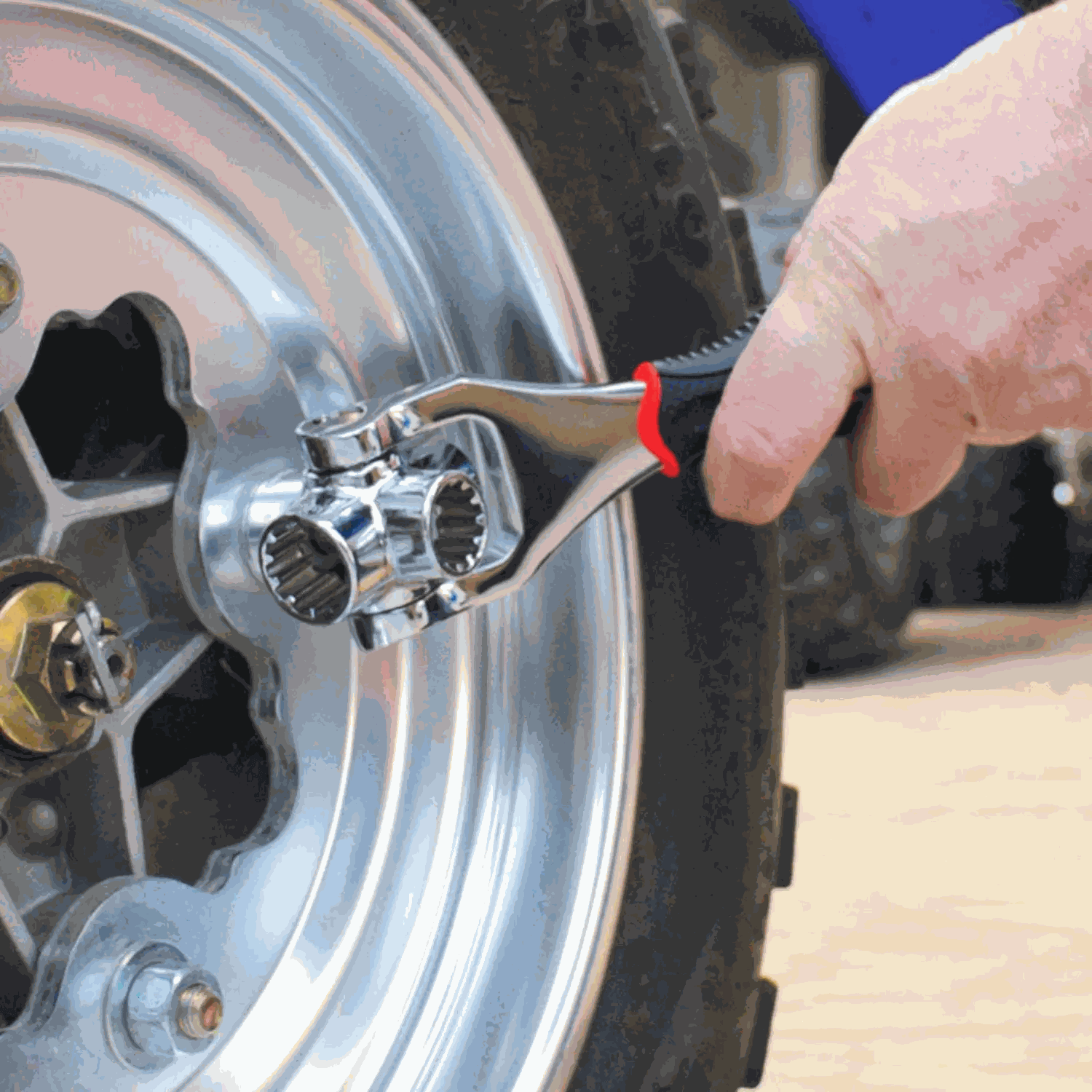 Universal wrench adjusting wheel nuts on a vehicle.