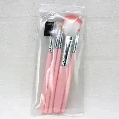5 piece portable makeup brush set with pink handles and nylon bristles in a clear case.