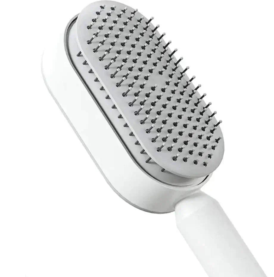 Women's 3D Hair Growth Self-Cleaning Brush with ergonomic design.
