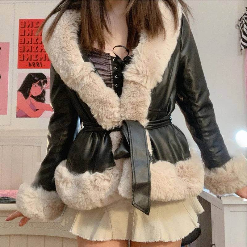 Model wearing a 2023 Autumn/Winter PU Leather Coat with fur collar and lace-up detail, styled with a skirt.