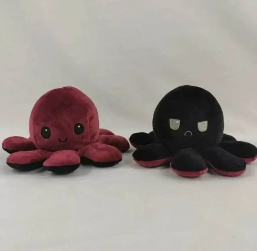 Double sided flip octopus plush toy showing happy and angry emotions in red and black colors