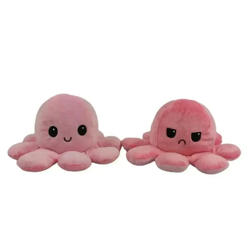 Double sided flip octopus plush toy showing happy and angry emotions in soft pink fabric