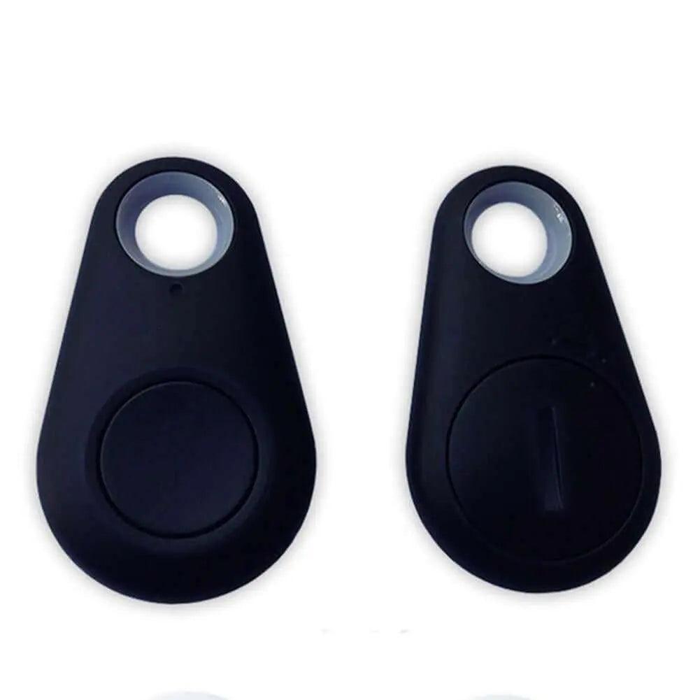 Two black Bluetooth trackers with keychain design for locating lost items.