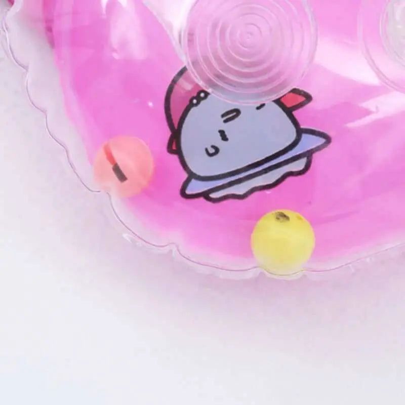 Pink baby neck float ring with playful design and colorful prints.