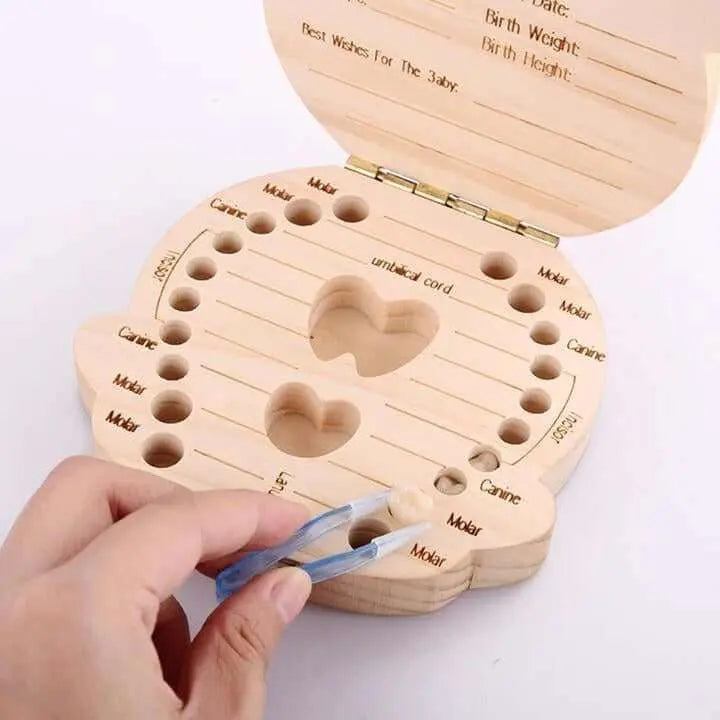 Baby wooden teeth organizer with slots for storing baby teeth and removable lid.