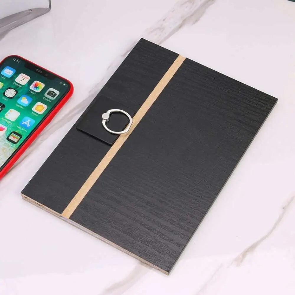 Mobile screen amplifier next to a smartphone on a marble surface.