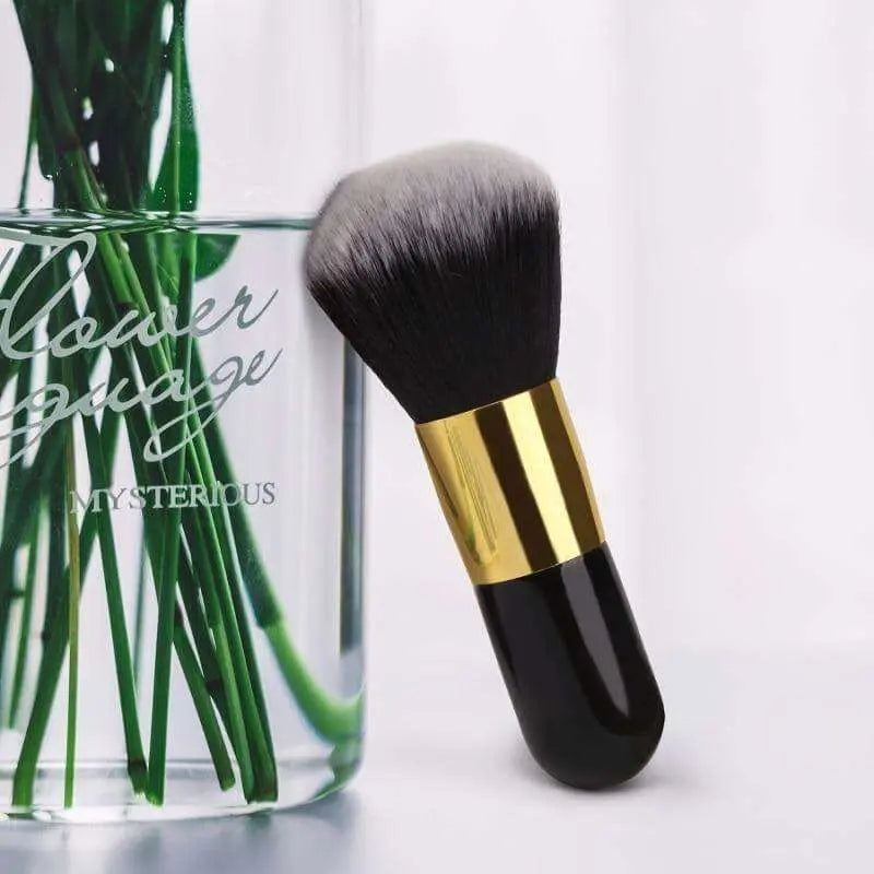 Chubby Face Makeup Brush with soft natural fiber and gold accents, ideal for seamless foundation application.