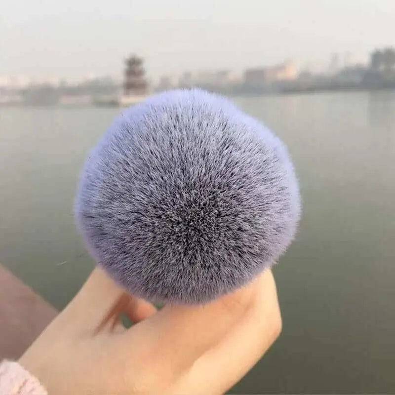Chubby Face Makeup Brush with soft bristles held in hand, ideal for smooth foundation application.