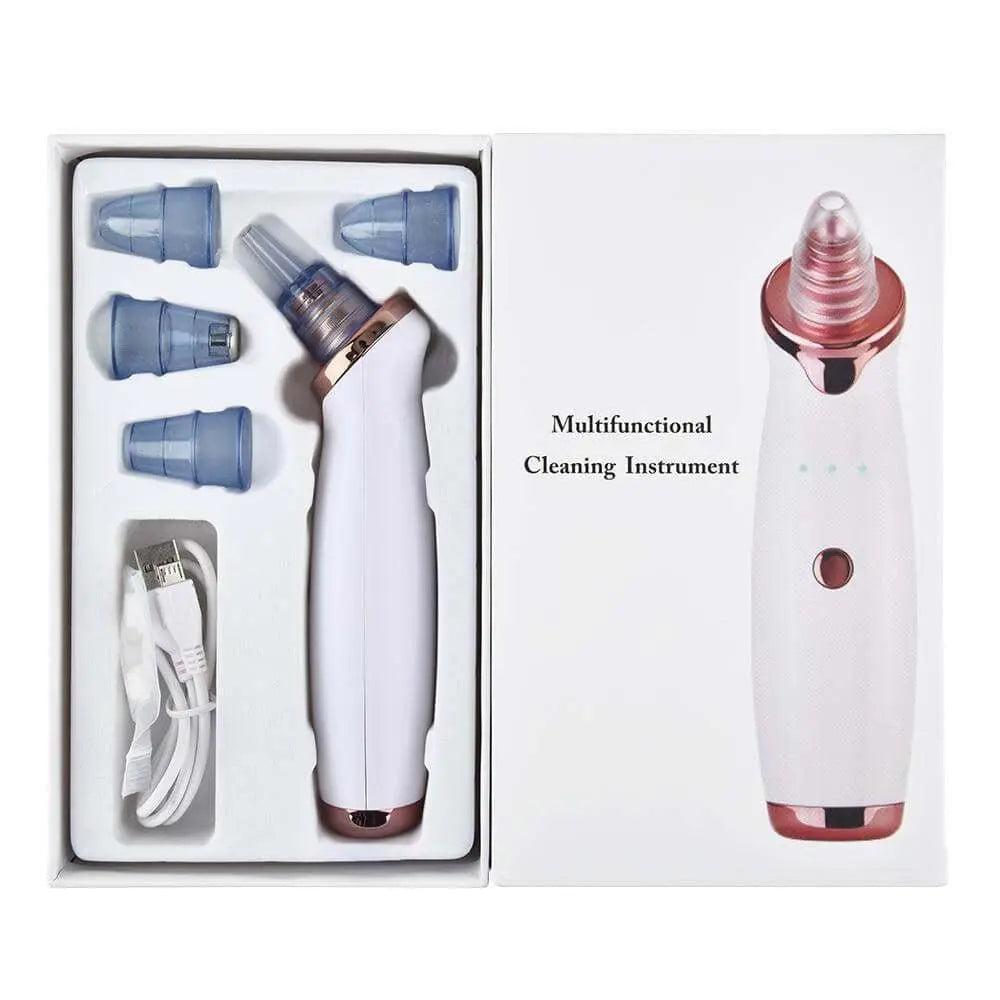 Electric vacuum facial blackhead remover with five blue suction heads and USB charger in packaging.
