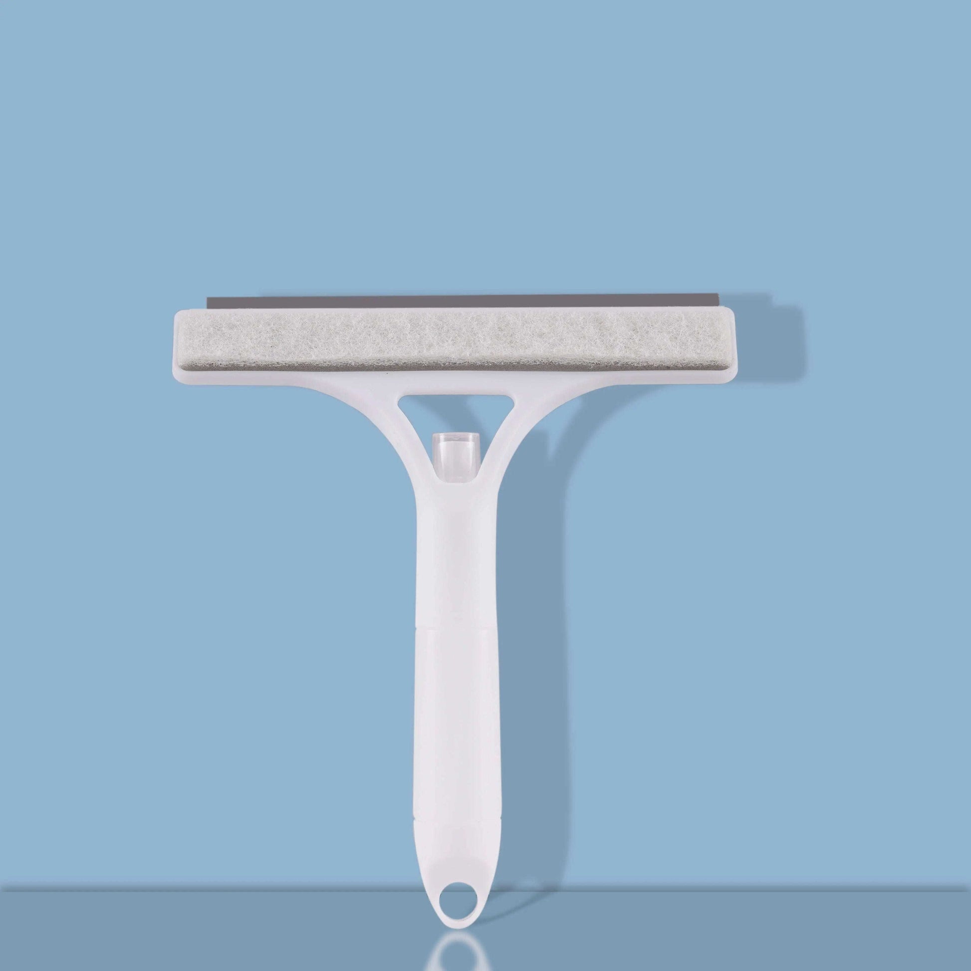 Glass cleaner wiper with scraper and sprayer against blue background.