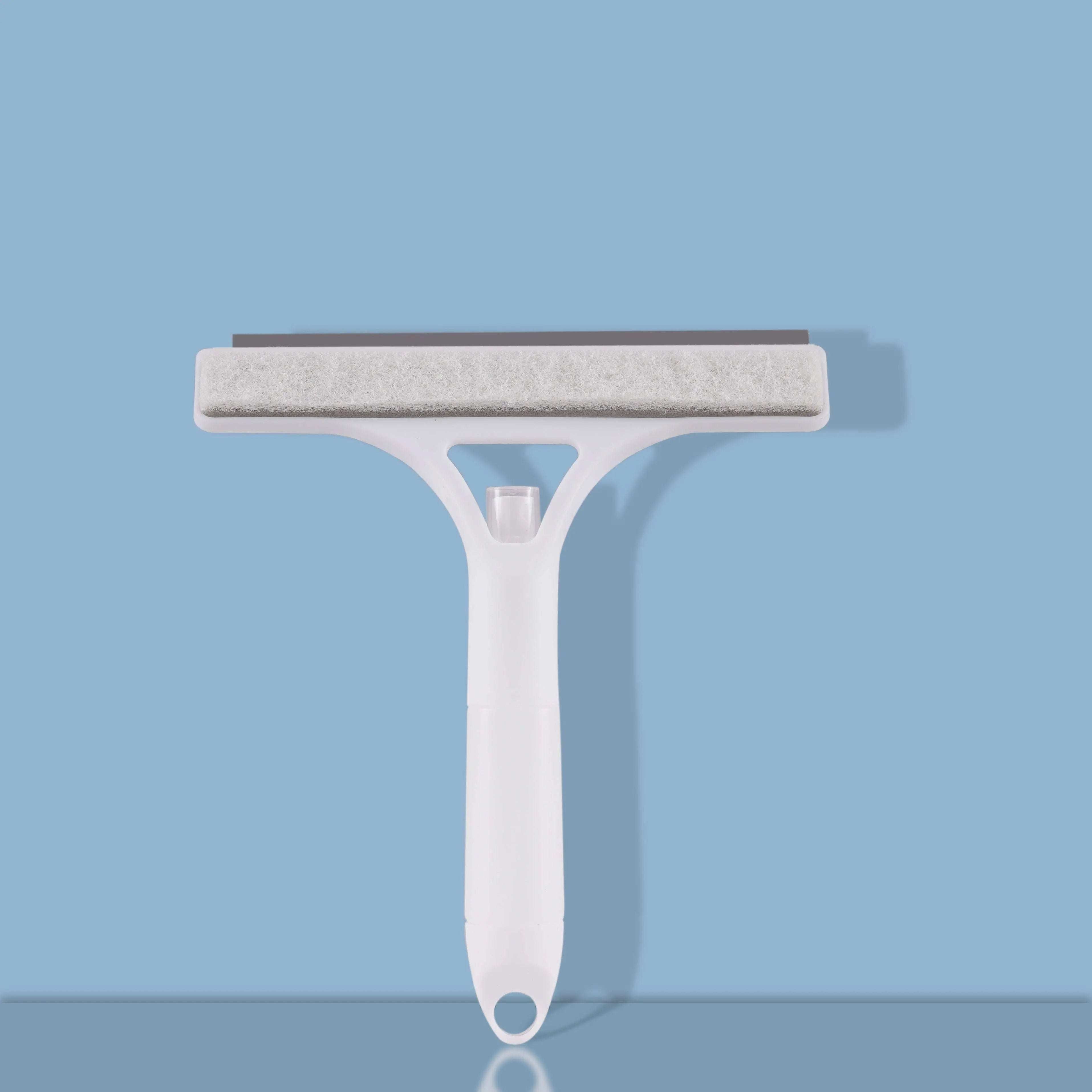 Glass cleaner wiper with scraper and sprayer against blue background.