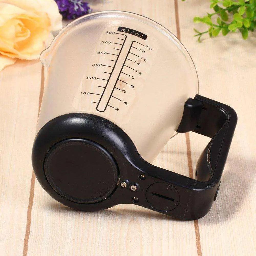 LCD Display Digital Measuring Cup with built-in scale for precise measurements.