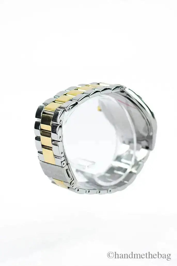 Michael Kors Slim Runway gold silver-toned watch showcasing stainless steel design and deployant closure.