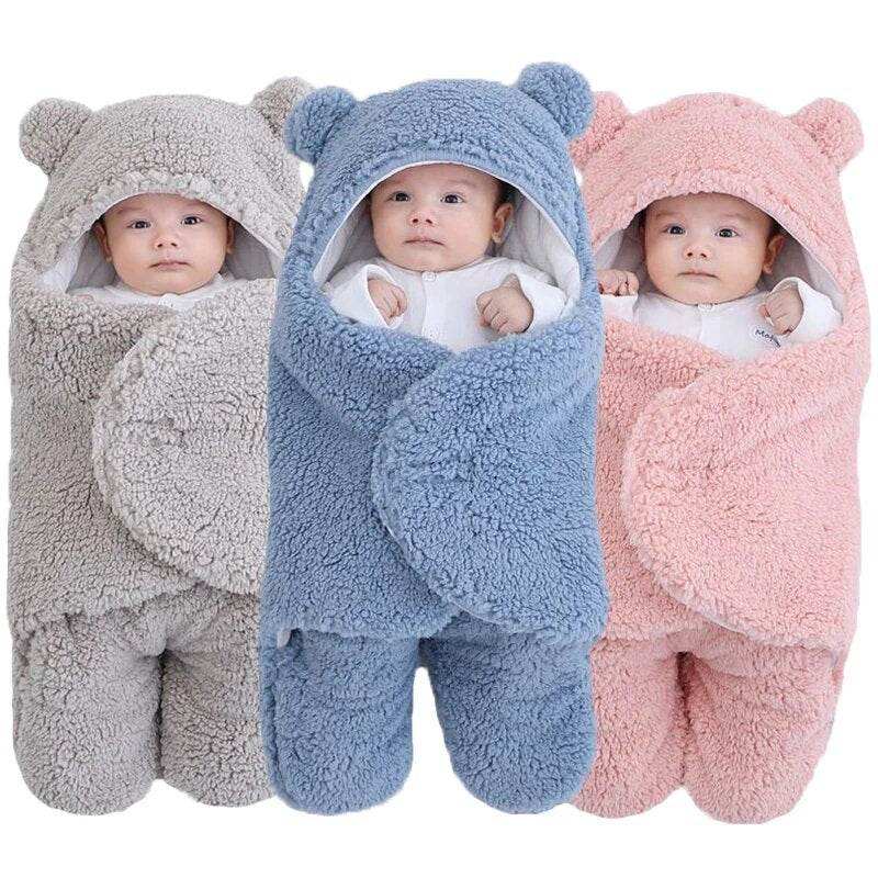 Ultra-soft starfish baby sleeping bag in gray, blue, and pink, featuring adorable hooded design.