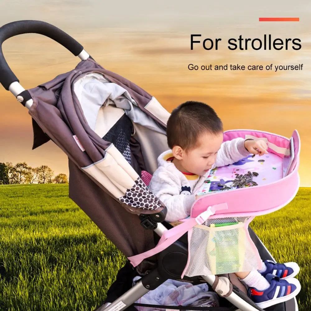 Portable waterproof baby car tray attached to stroller, providing a secure play and activity surface for children during travel.