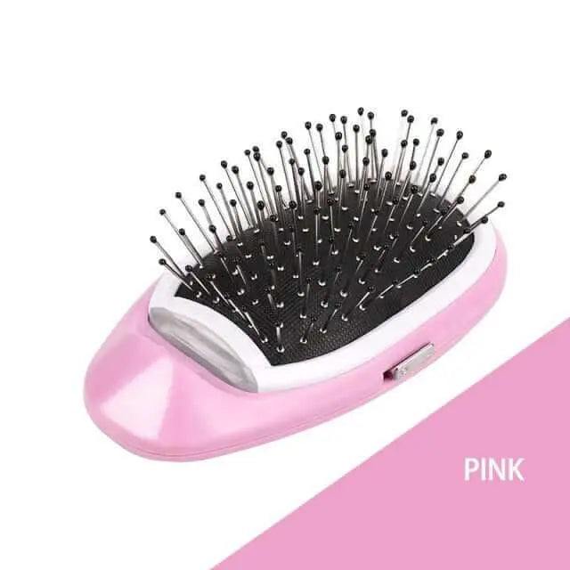 Portable electric ionic styling hairbrush in pink, designed for frizz-free, shiny hair.
