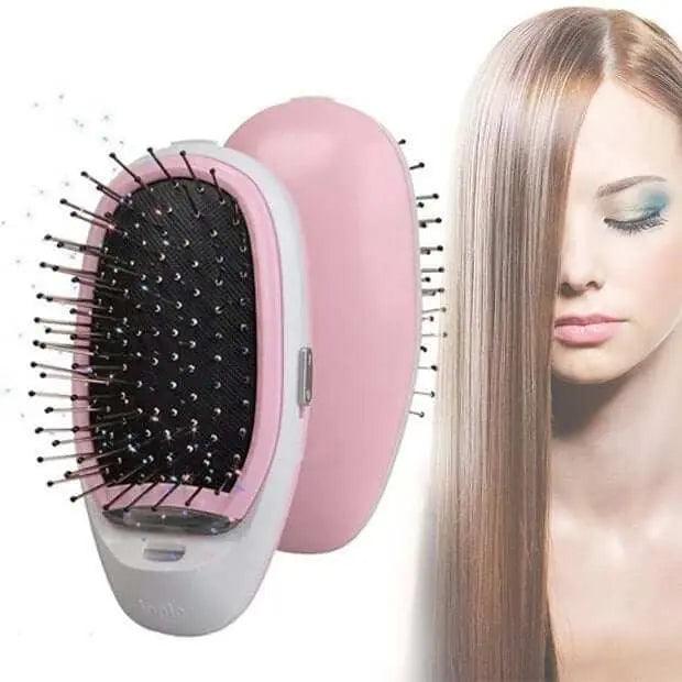 Portable electric ionic styling hairbrush with pink and black bristles, promoting frizz-free, smooth hair.