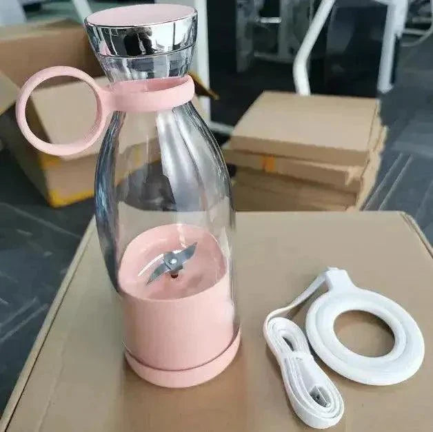 Portable fresh fruit blender with rechargeable USB, featuring a compact pink design and convenient handle.