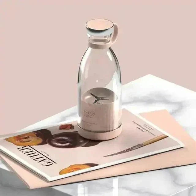 Portable Fresh Fruit Blender with rechargeable battery on table.
