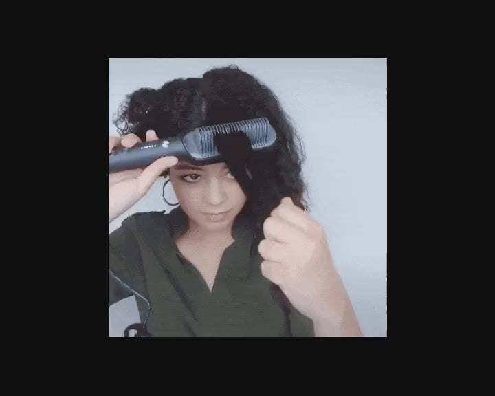 Load video: Woman using Self Cleaning Hair Brush for easy detangling and smooth styling, showcasing its effortless glide through hair.