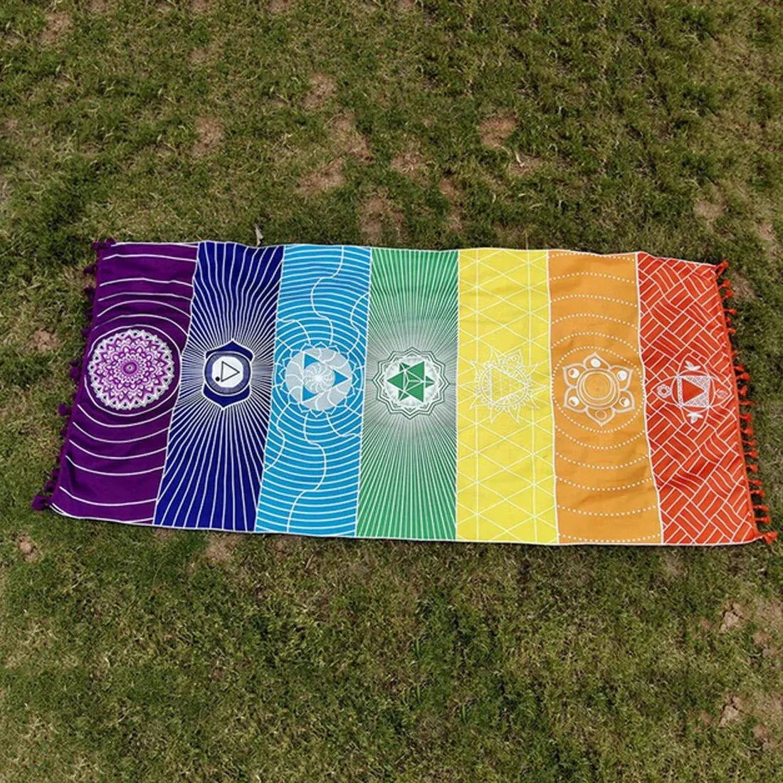 Polyester Bohemian Beach Yoga Mat with vibrant colors on grass.