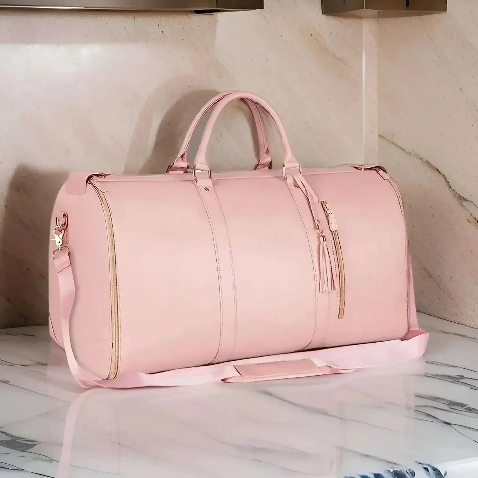 Pink foldable travel duffle bag on marble surface, featuring spacious interior and water-resistant material.