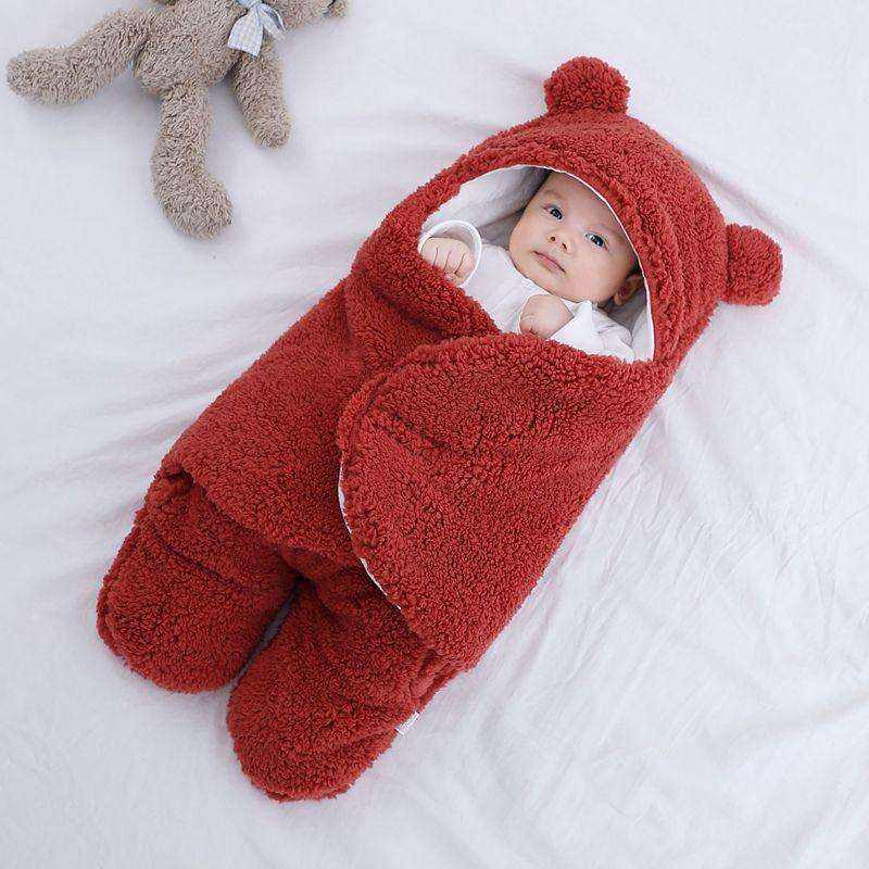 Ultra-soft red starfish baby sleeping bag with hood, cozy and cute design.