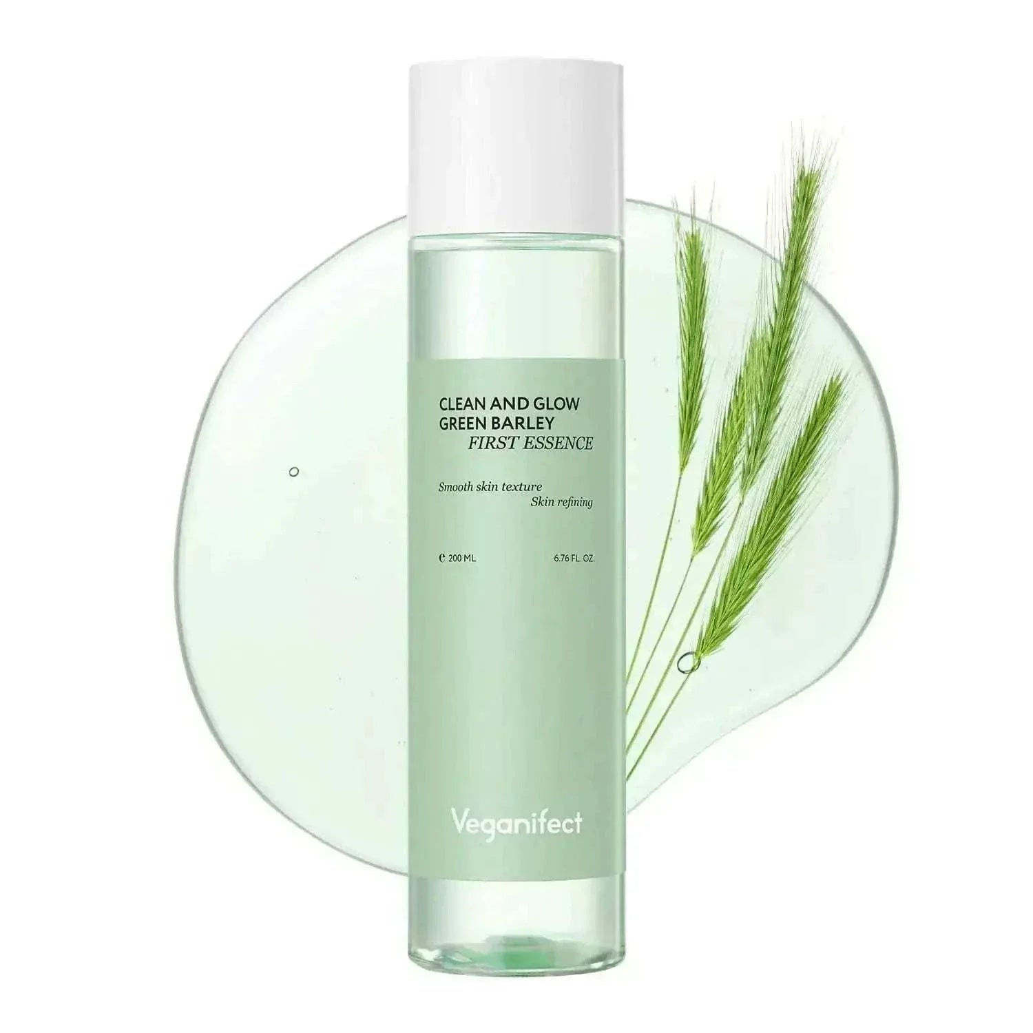 Exfoliating essence bottle with green barley for hydration and glowing skin.