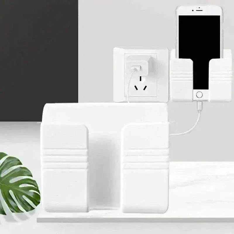 Wall-mounted phone holder with charging slot.
